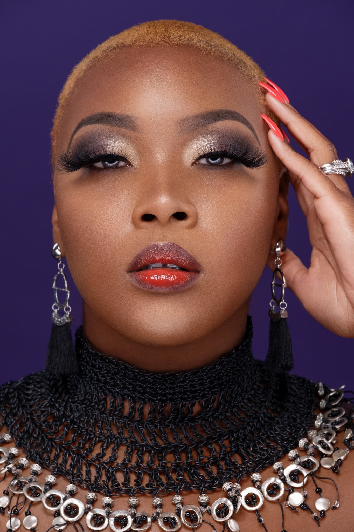 Silver shimmer & full lashes — makeup by Miss Tika