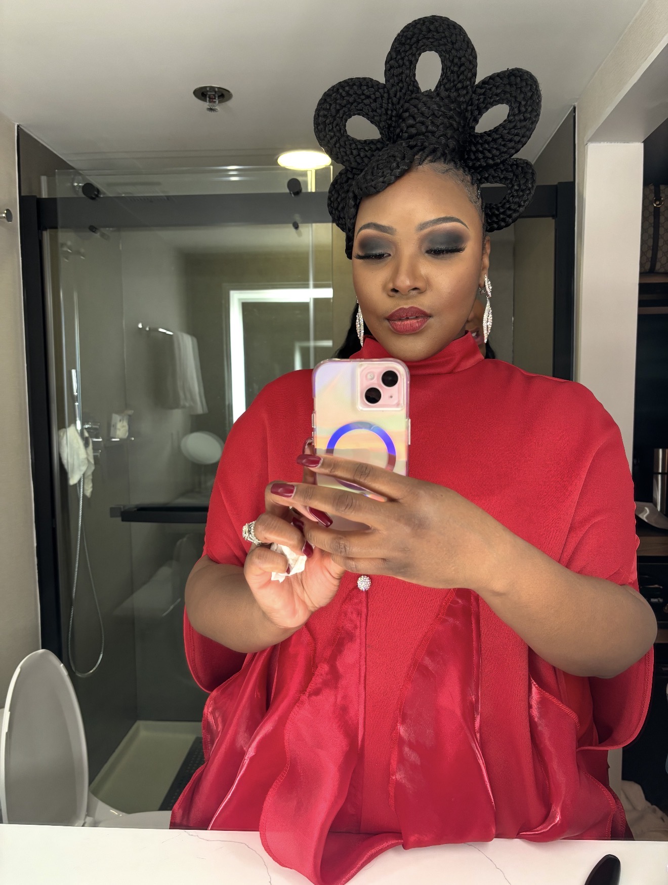 Smoky eyes & a statement red lip — makeup by Miss Tika