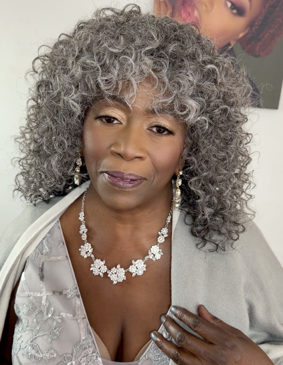 Finished makeup with soft eyes and a plum lip